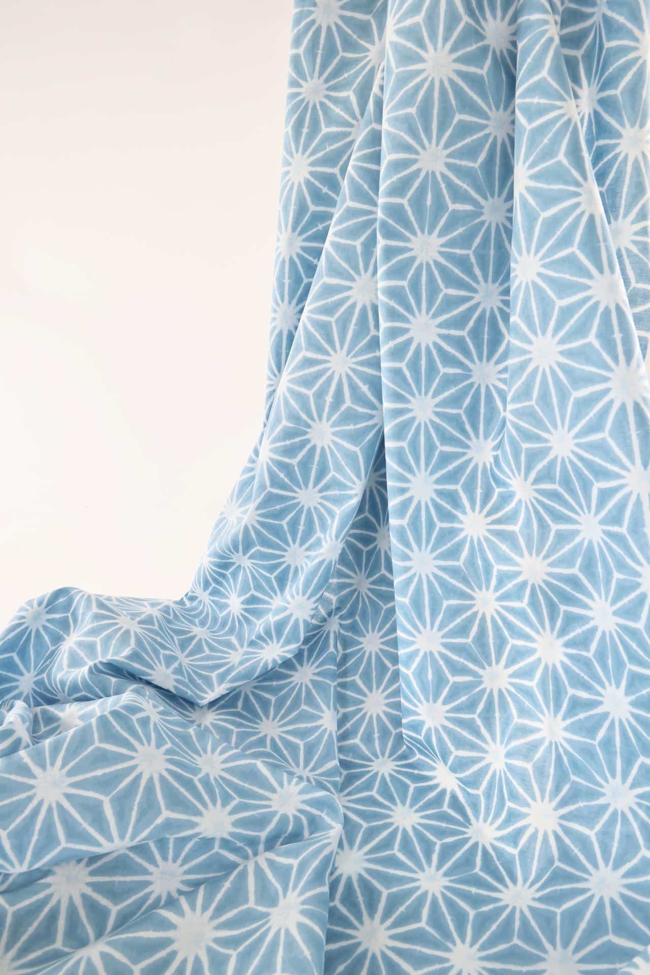 Asanoha Shibori white fabric blue background