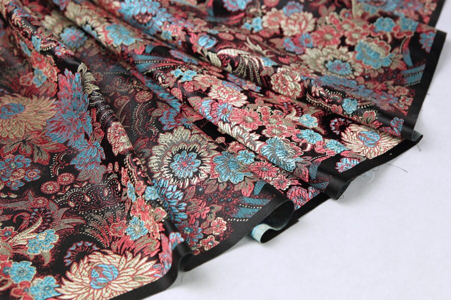 Brocade fabric chrysanthemum black background