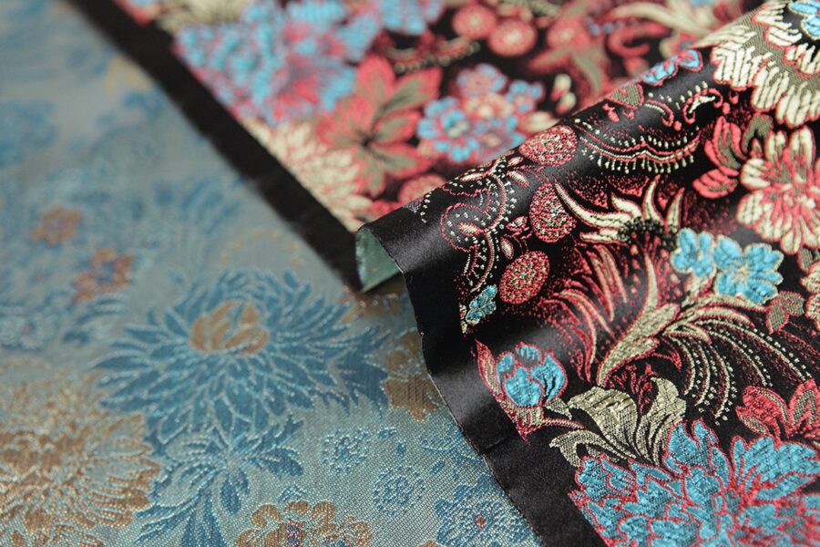 Brocade fabric chrysanthemum black background