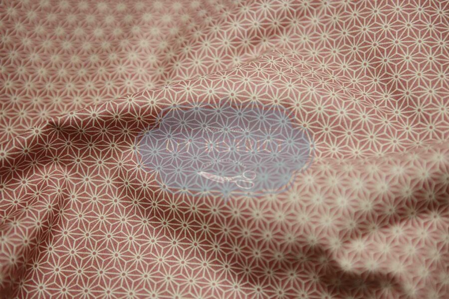 Japanese fabric Asanoha ecru on a pink background