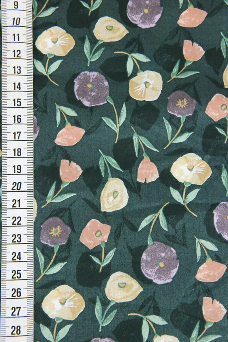 Liberty-style floral cotton lawn green background