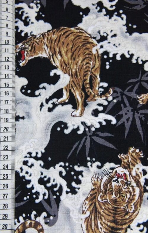Japanese fabric tiger on black background