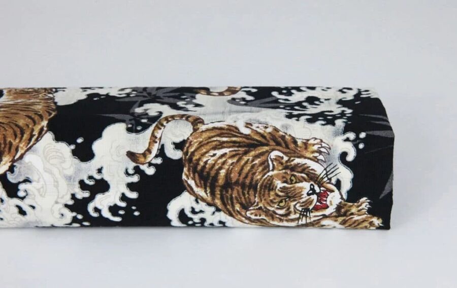Japanese fabric tiger on black background