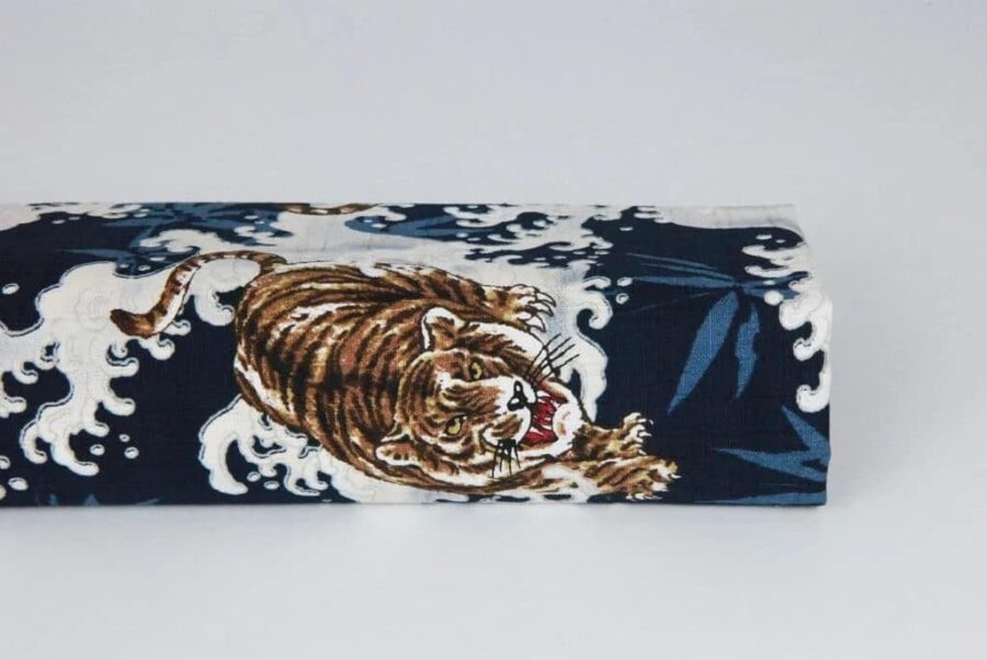 Japanese fabric tiger on blue background