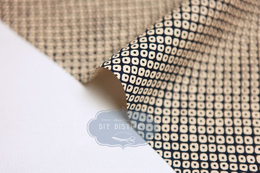 Sevenberry Kanoko ecru fabric with blue background