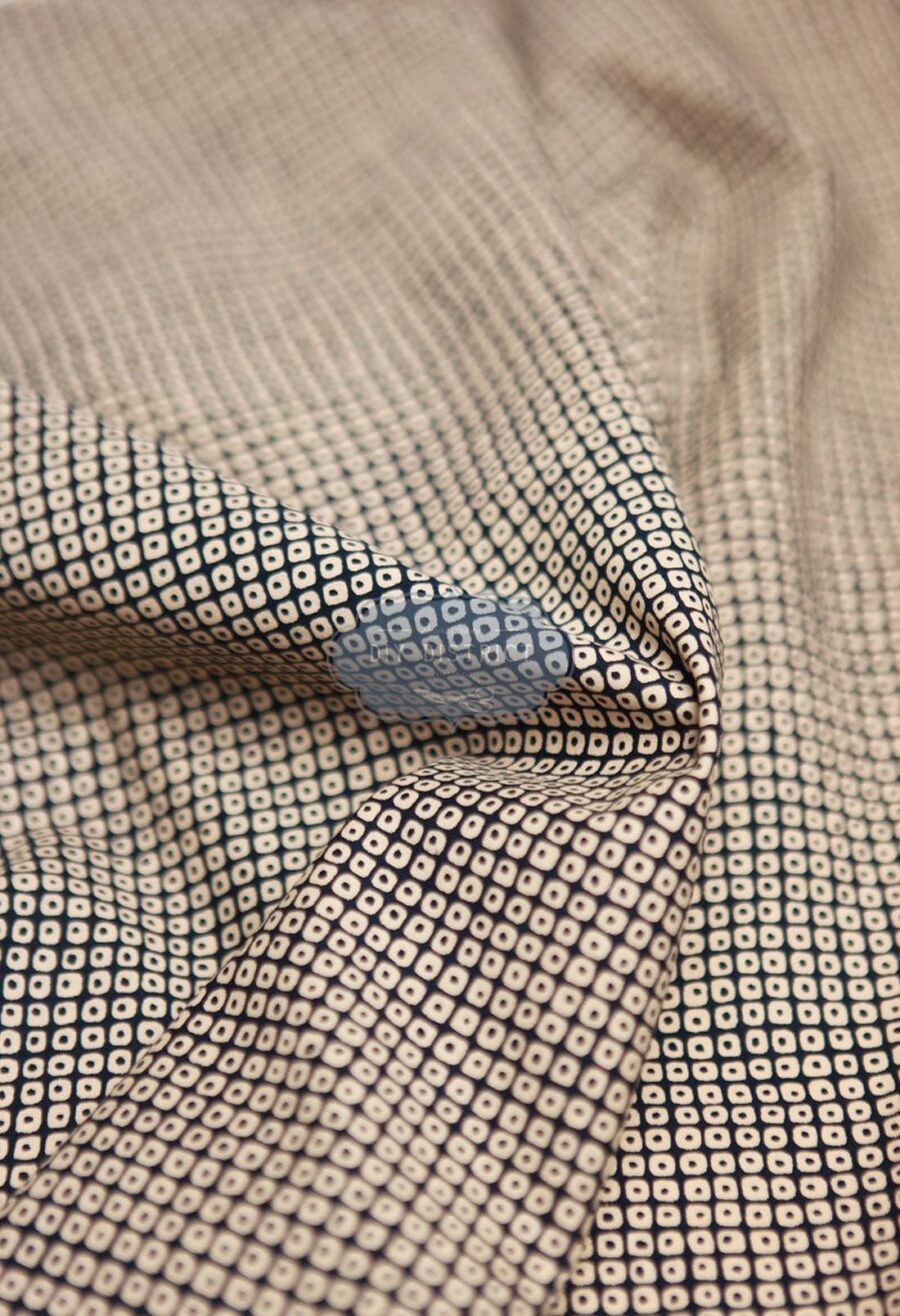 Sevenberry Kanoko ecru fabric with blue background