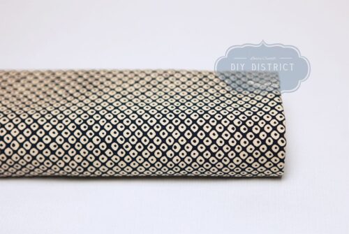 Sevenberry Kanoko ecru fabric with blue background