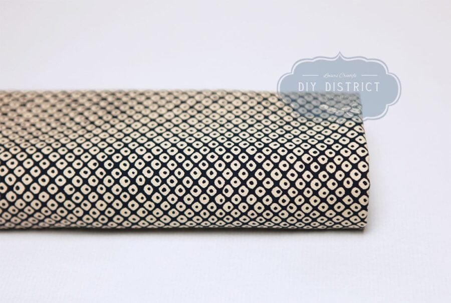 Sevenberry Kanoko ecru fabric with blue background