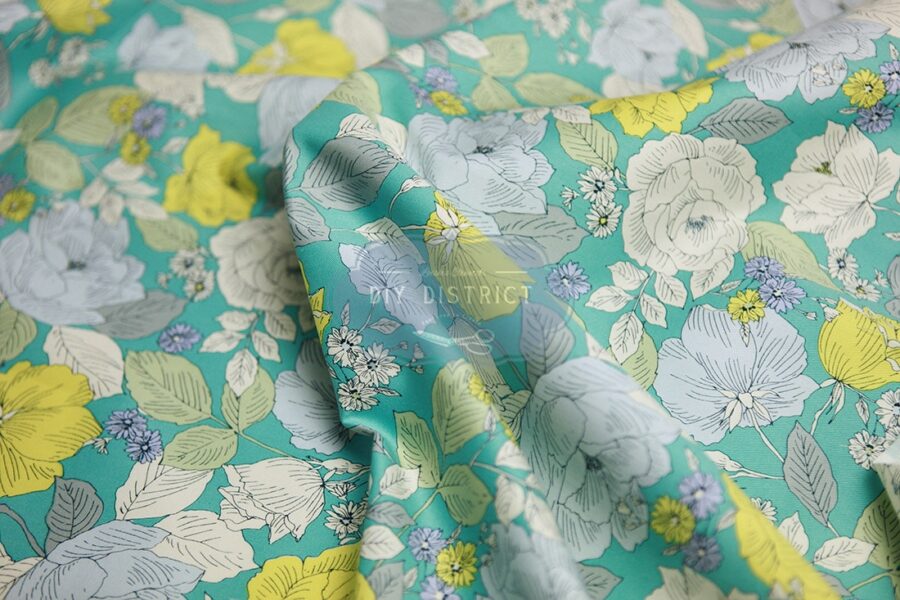 Sevenberry cotton twill flowers turquoise background