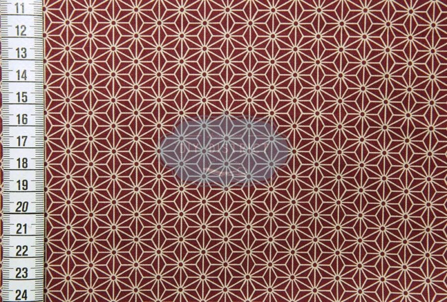 Japanese fabric Asanoha ecru on a red background