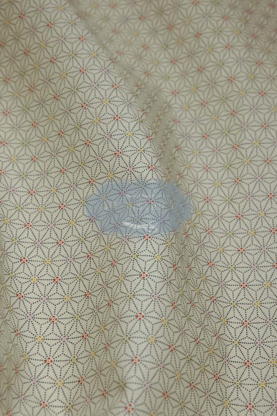 Asanoha fabric dotted with ivory background