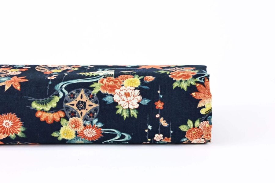 Tissu Japonais fleurs dans l'eau fond bleu