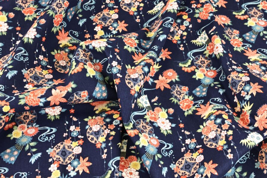 Tissu Japonais fleurs dans l'eau fond bleu
