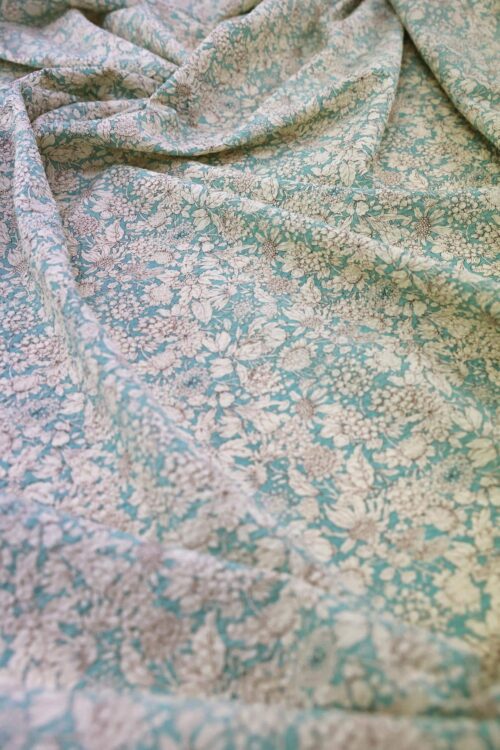 Tissu seersucker fleurie type liberty fond turquoise. Japanese fabric