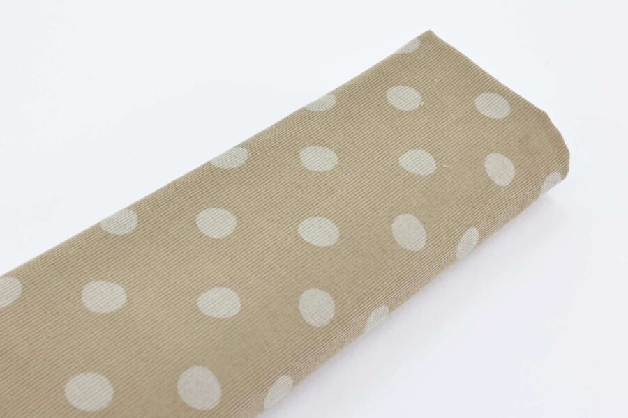 Tissu velours côtelé bio imprimé fond beige. organic fabric