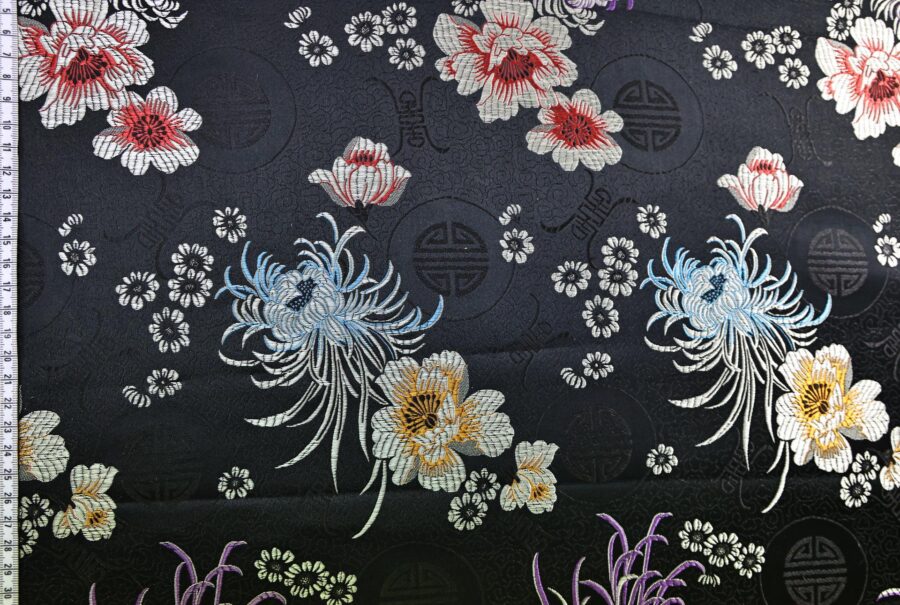 Brocart jacquard noir fleurie colorée. brocard fabric