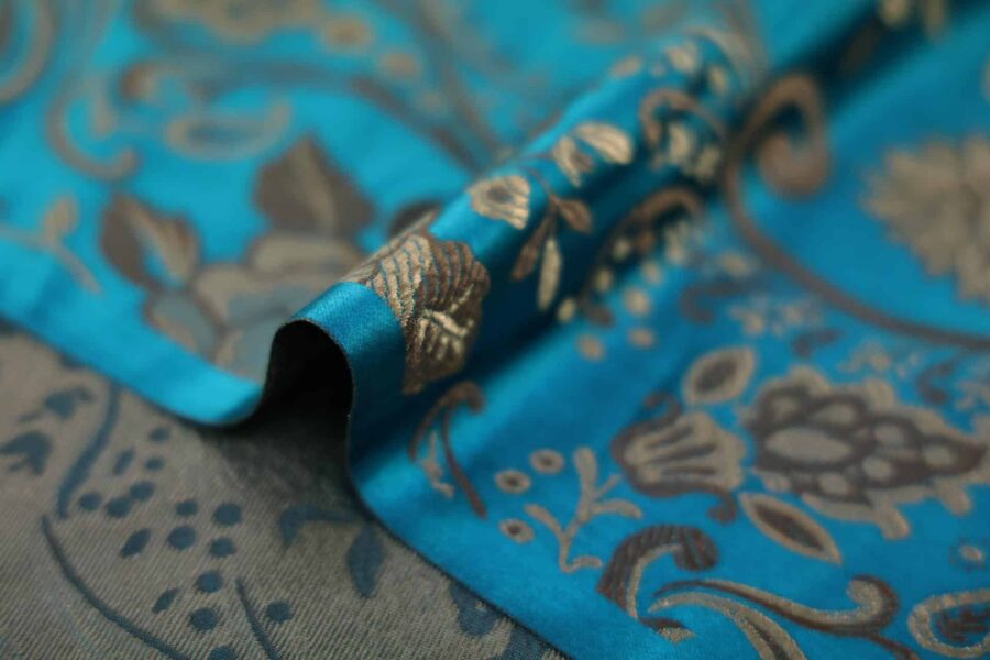 Tissu brocart fleur bronze fond bleu canard. Brocard fabric