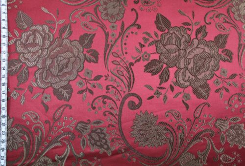 Tissu brocart fleur bronze fond rouge. Brocard fabric