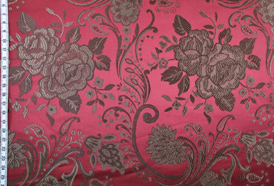 Tissu brocart fleur bronze fond rouge. Brocard fabric