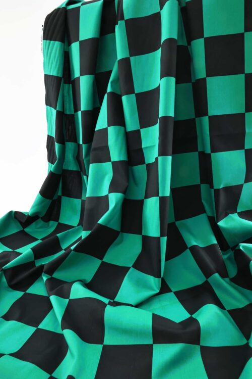 Tissu manga Japonais Ichimatsu vert et noir. Manga fabric