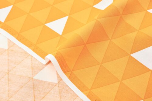 Tissu manga Japonais Uroko jaune orange. Manga fabric