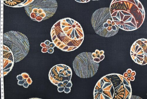 Japanese fabric Temari ball on navy blue background