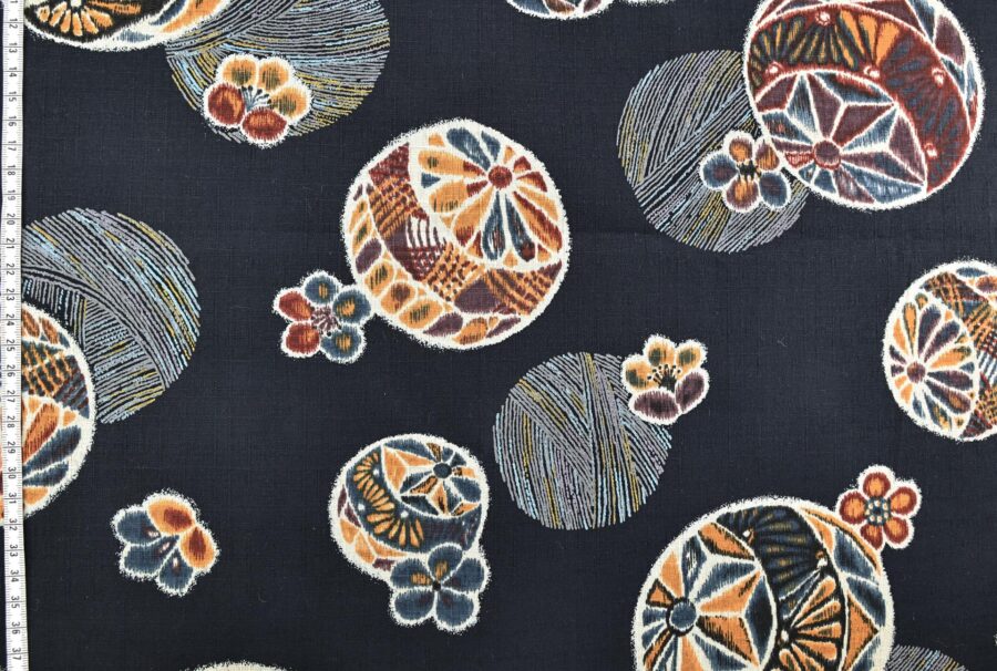 Japanese fabric Temari ball on navy blue background