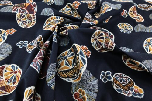 Japanese fabric Temari ball on navy blue background