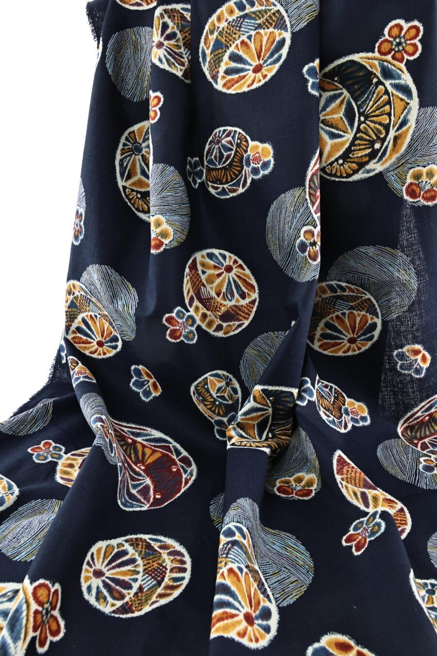 Japanese fabric Temari ball on navy blue background