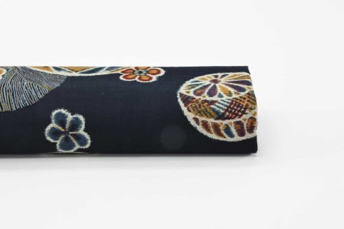Japanese fabric Temari ball on navy blue background