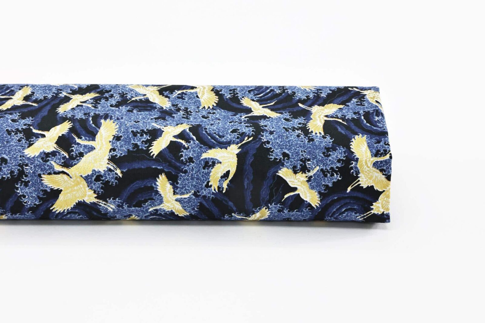 Japanese fabric with golden cranes and blue waves