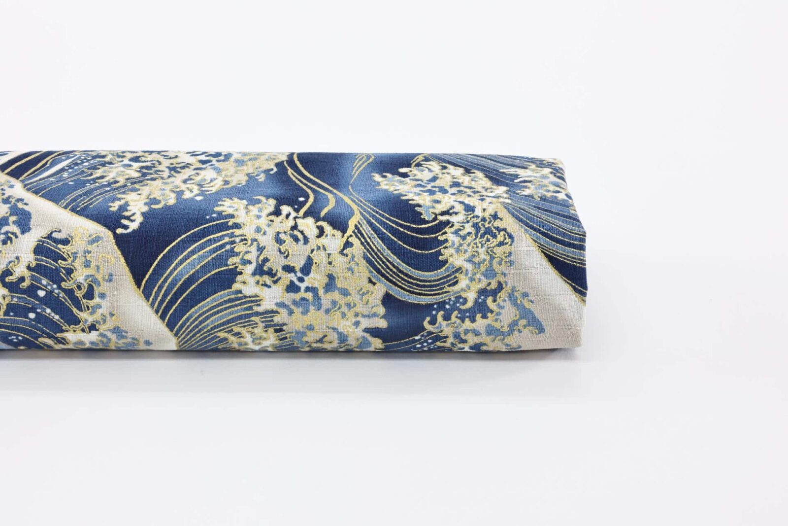 Japanese fabric with golden waves on blue dobby cotton