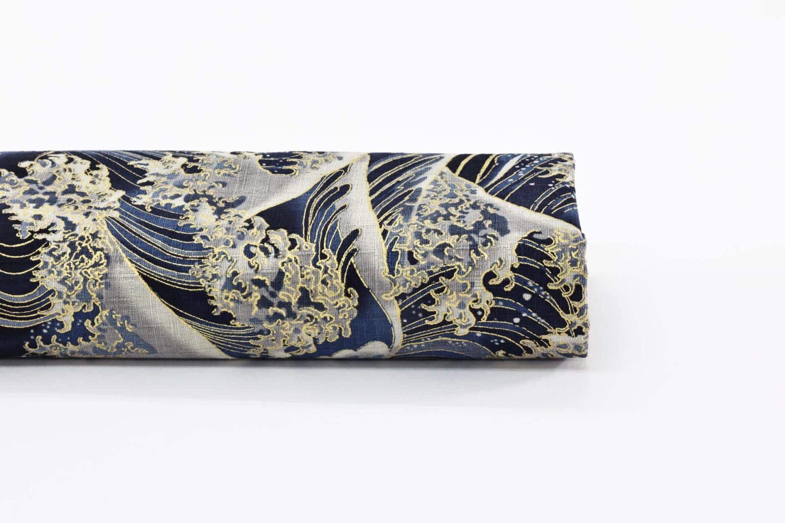 Japanese fabric with golden waves on navy blue dobby cotton