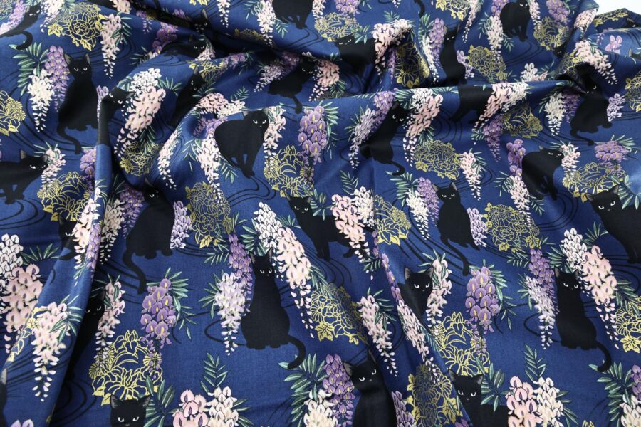 Black cat and Fuji flower fabric blue background