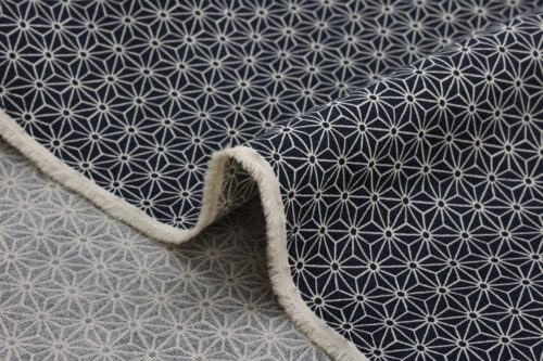 Japanese fabric Asanoha ecru on a blue grey background