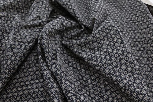 Japanese fabric Asanoha ecru on a blue grey background