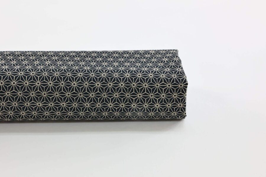 Japanese fabric Asanoha ecru on a blue grey background