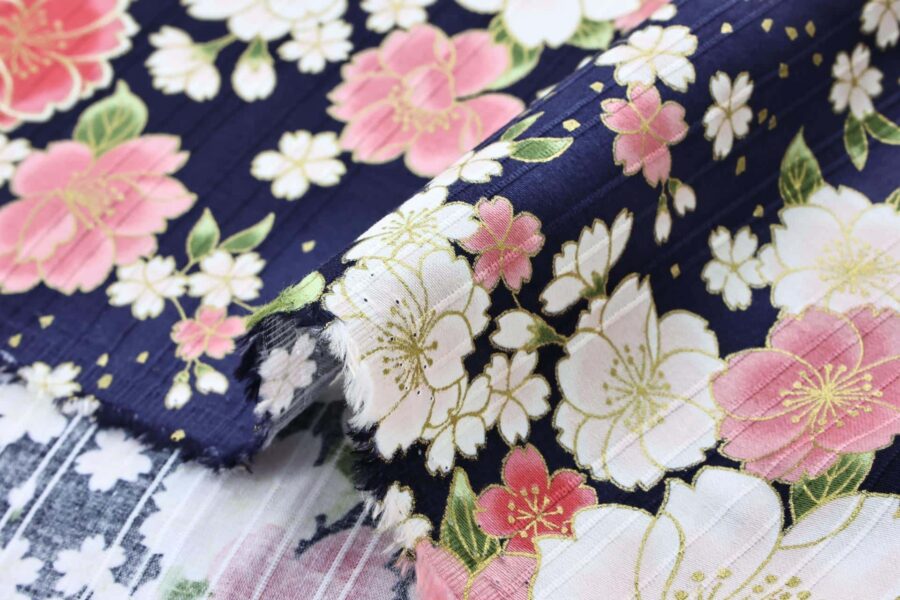 Japanese fabric golden cherry blossoms on blue background