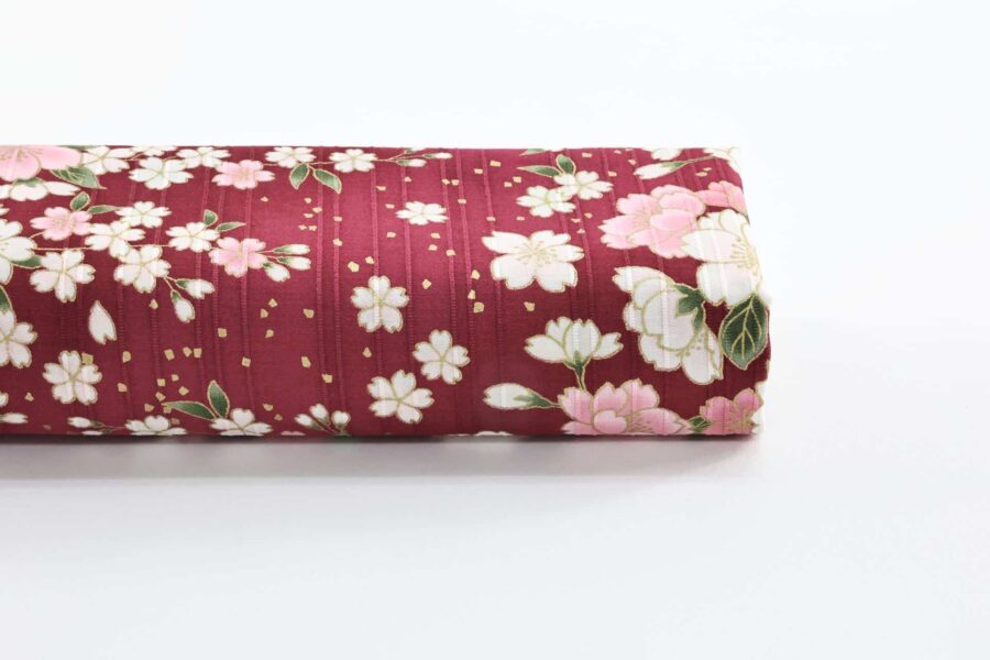 Japanese fabric golden cherry blossoms on red background