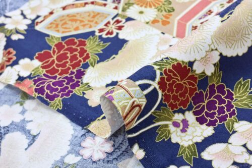 Japanese fabric Kaike with colorful flowers blue background