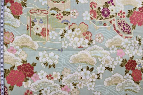 Japanese fabric Kaike with colorful flowers green background