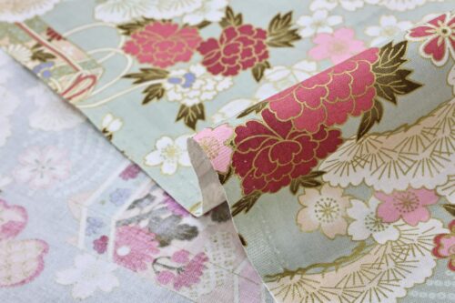 Japanese fabric Kaike with colorful flowers green background