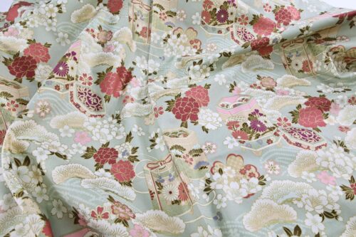 Japanese fabric Kaike with colorful flowers green background
