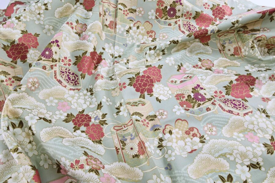 Japanese fabric Kaike with colorful flowers green background