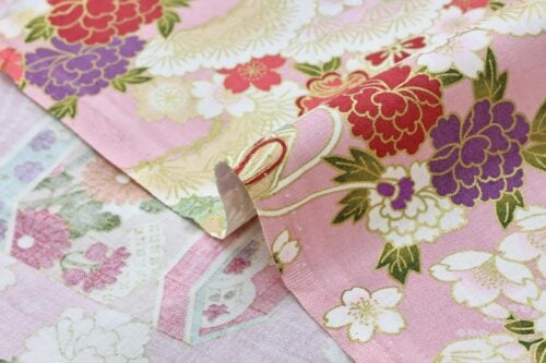 Japanese fabric Kaike with colorful flowers pink background