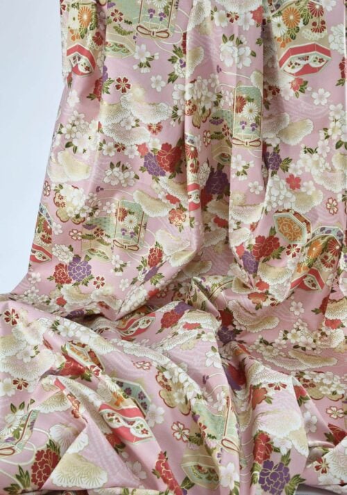 Japanese fabric Kaike with colorful flowers pink background