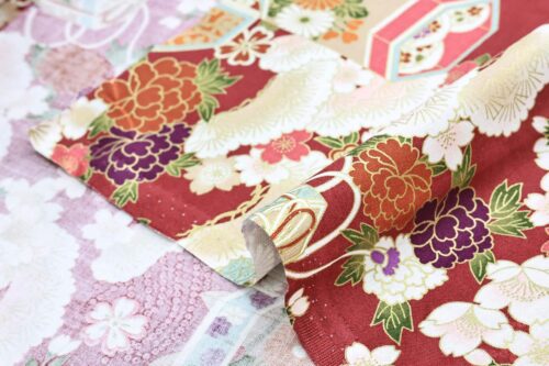 Japanese fabric Kaike with colorful flowers red background