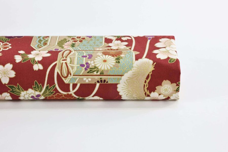 Japanese fabric Kaike with colorful flowers red background