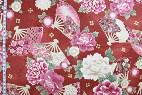 Japanese fabric fans and golden peonies on red