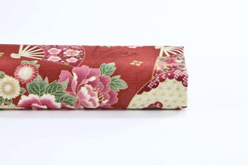 Japanese fabric fans and golden peonies on red